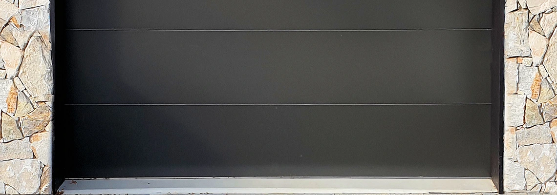 Overhead Black Garage Door Installation in Riverview, Florida